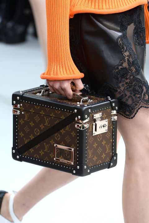 Vuitton is synonymous with its steamer trunks, and after exploring the shape in mini bags in recent seasons, the French house is going bolder with bigger, square trunks—all the better to show off that logo.
