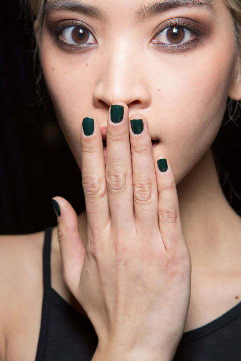 Katie Jane Hughes layered Butter London Nail Lacquer in Racing Green on top of Union Jack Black for a deep, forest green manicure.