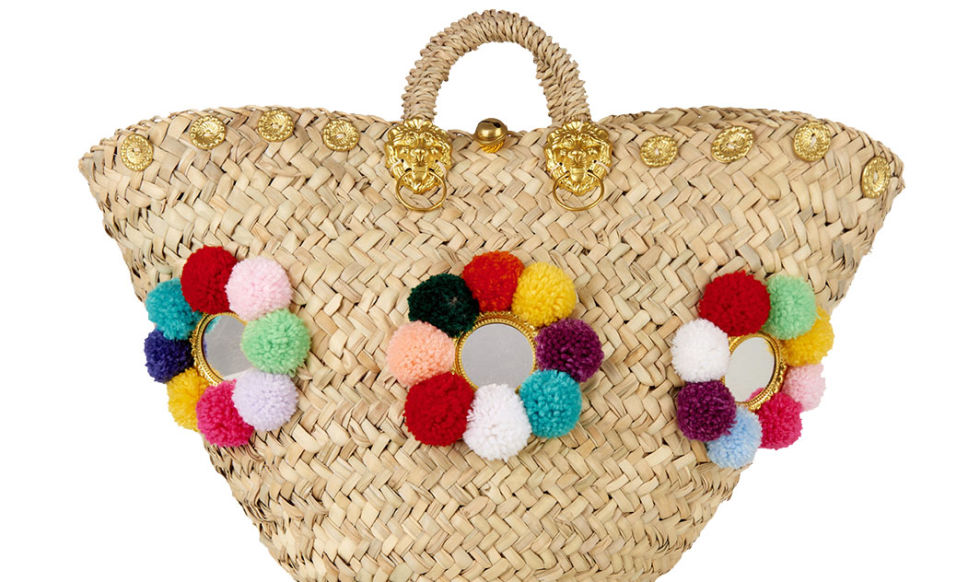 In the summer I live in Muzungu Sisters caftans and am never without my straw pom pom bag. Perfect for beach holidays and long summer days.