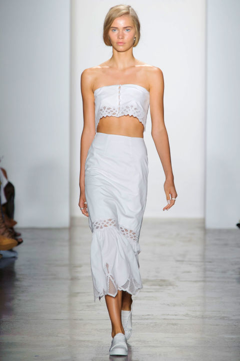 Simkhai is a master of the crop top bringing that feminine charm to a lattice embroidery top and skirt pair.