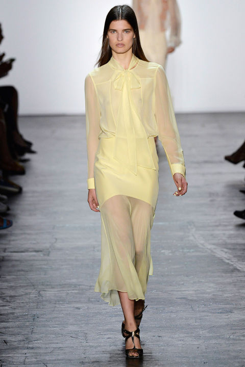 Smartly, Gurung mixed the ethereally pretty looks he is known for—the sheer gauzy blouses and flyaway dresses and silky gowns with architectural details—with sportier fare, like ribbed off-the-shoulder sweater dresses and long-sleeved gowns that clung to the body, with graphic patterns in orange, yellow and gold.