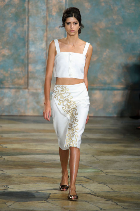 An iridescent organza top and skirt in white emphasizes the contrast of natural against glamour—Talitha Getty in her gilded finery against the Moroccan desert comes to mind.—Kerry Pieri