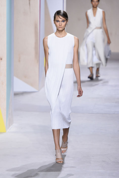 And somewhere in between, the two ideas met in sleek-chic white dresses and vest suits for the citified lady whose catchphrases are modern, serene and effortless.