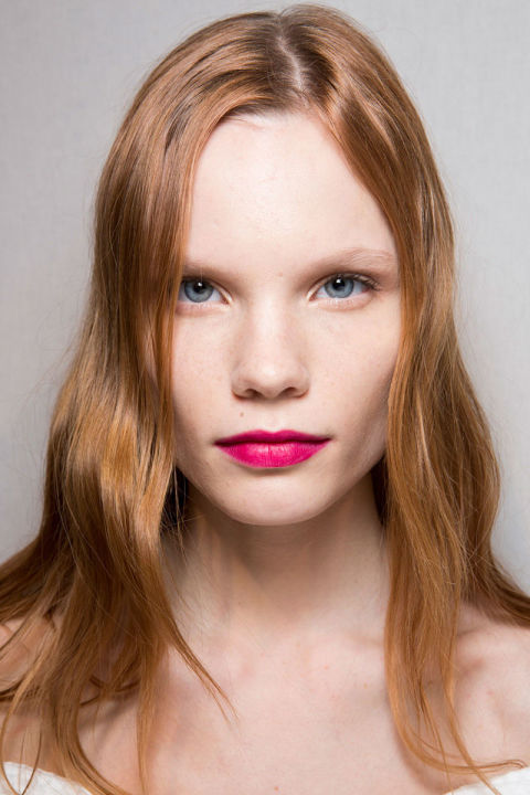 Like the Fall collection, the hair and makeup were a loud celebration of color, texture and quirkiness. Pat McGrath gave models one of three looks: au naturale, exaggeratedly pink cheeks or fuchsia lips (the shade—Gucci Sensuous Deep Matte in Adrenaline—launches June 2016), while Paul Hanlon played with the hair's texture, adding a bit of wave and shine to girls with straighter hair, embracing and enhancing curly hair and throwing some crimped strands in on others just for fun.<br />