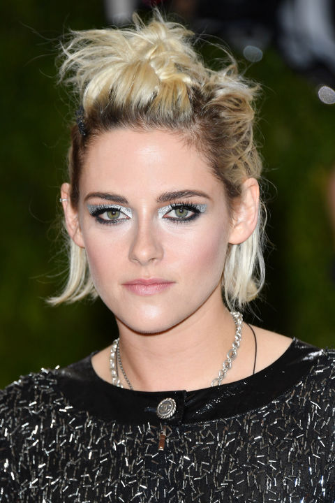 Metallic eye makeup paired with short, twisted tresses is the kind of pretty punk look we didn't know we loved. <br />