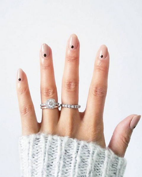 Manicure minimalists: a petite dot at the base of the nail is easiest way to experiment with nail art.
@deborahlippmann