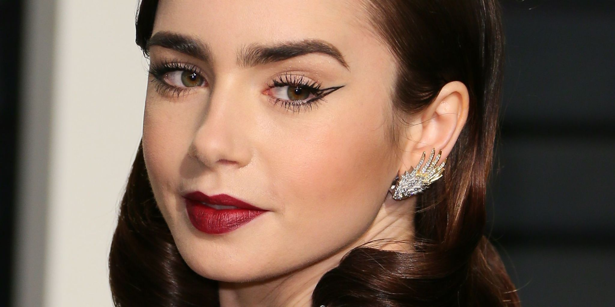 Lily Collins Glows in All-Brown Outfit at "Emily in Paris" Event