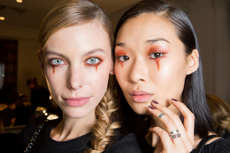 Makeup artist Polly Osmond described the look at Christian Siriano as "Victorian Techno Goth." But while the dripping "rivers" of copper eyeshadow were an editorial look best left to the runways, the fishtailed braid with bits of copper strung throughout were just downright gorgeous.&nbsp;