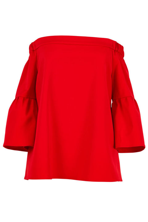 "Anything in black is always my go-to, but my closet is starting to feel flat with too many pieces in the same staple color. My style resolution for 2017 is start buying shapes I know I love, but in brighter shades. This off-the-shoulder top in a punchy red is calling my name."
Tibi top, $285, shop.harpersbazaar.com. 